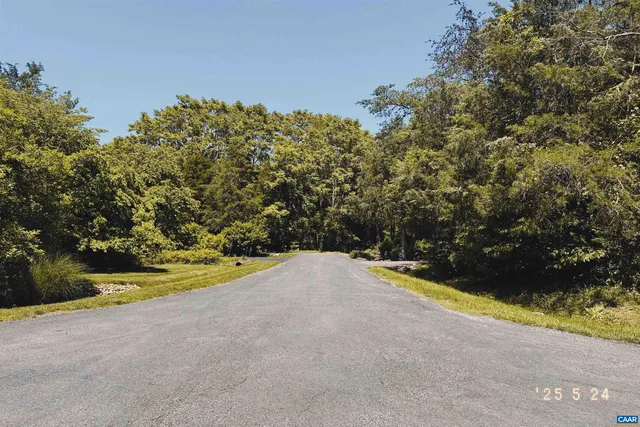 a view of a swimming pool and an outdoor space