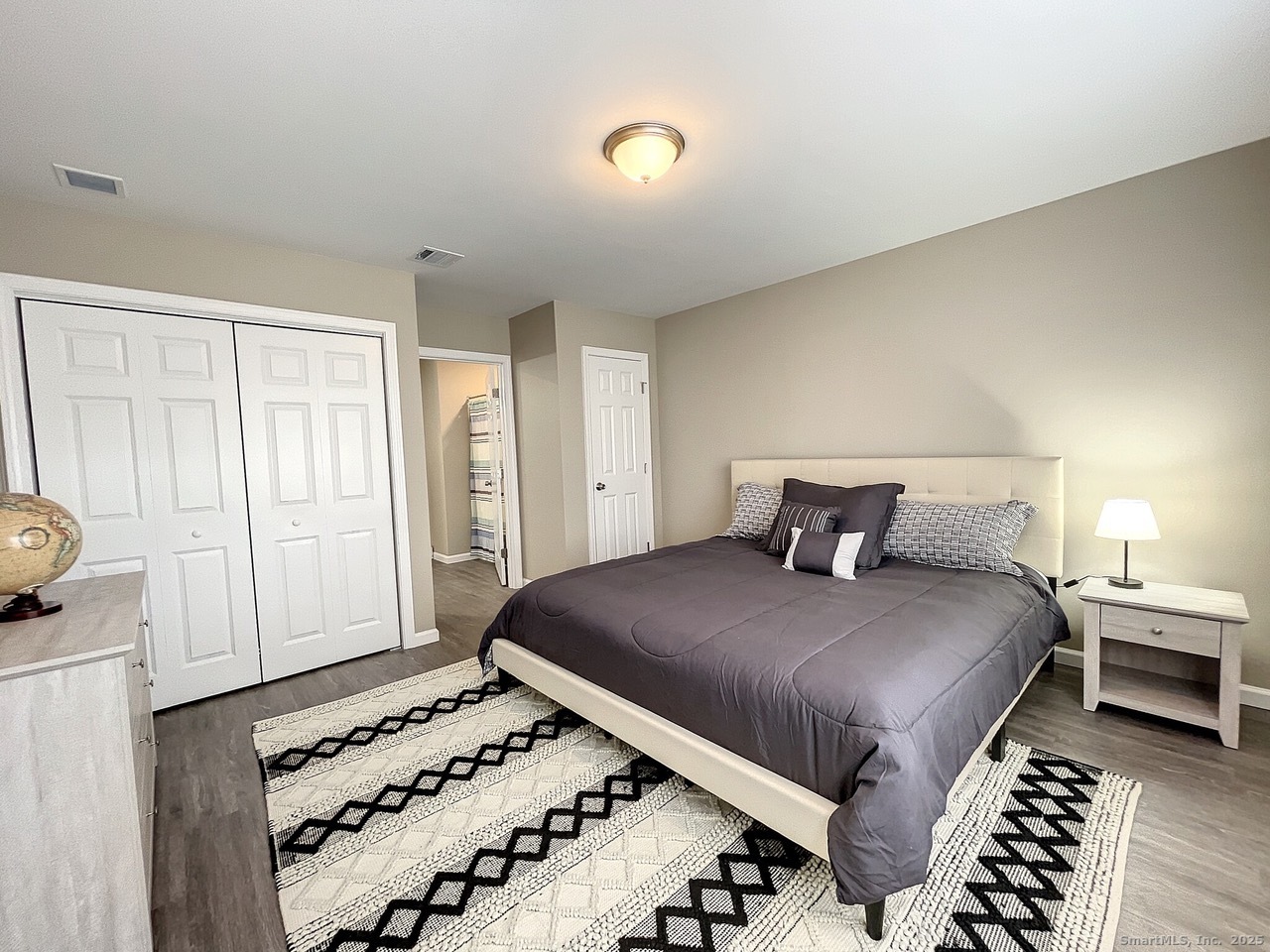 Undisclosed Address Salem, CT 06420 - Photo 14 of 17 a bedroom with a bed and a window