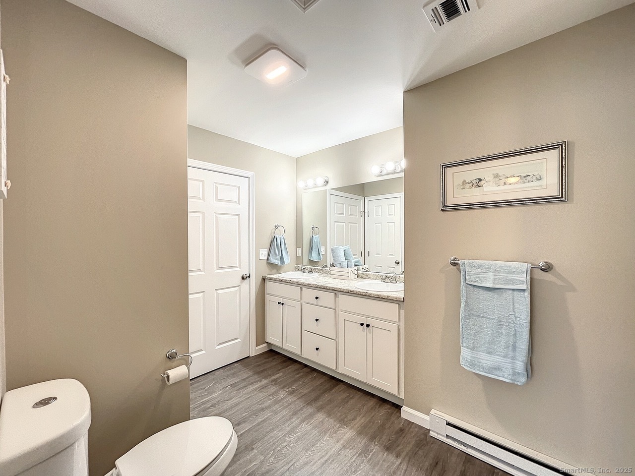 Undisclosed Address Salem, CT 06420 - Photo 17 of 17 a bathroom with a granite countertop toilet sink and mirror