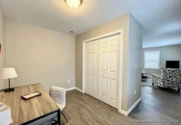 a bedroom with furniture and a bed