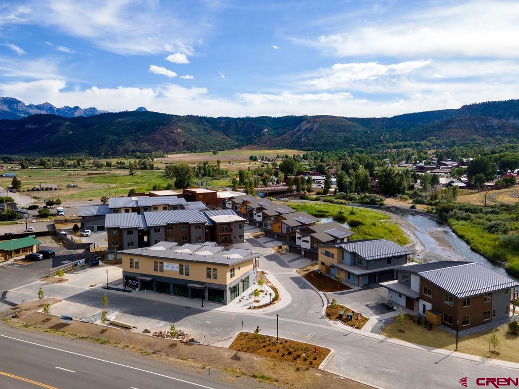 199 Riverfront Lane, Unit 101 Ridgway, CO 81432 - Photo 17 of 21 a view of a swimming pool and lounge chairs