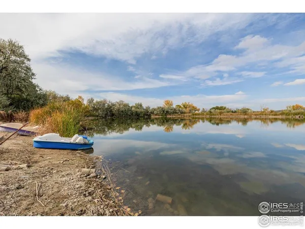 a view of a lake with beach