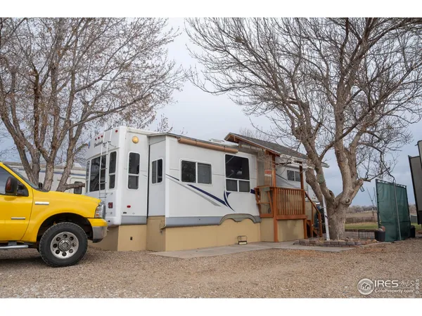 a white house with a outdoor space