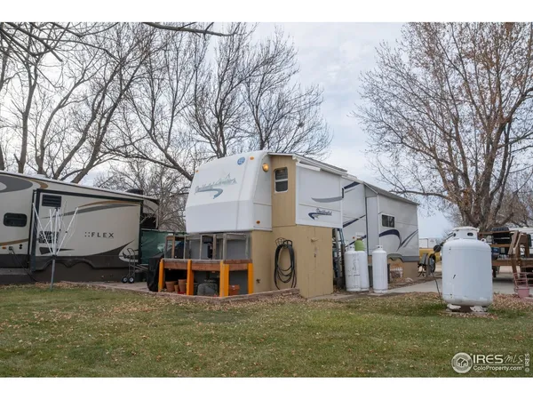 a view of a back yard of the house