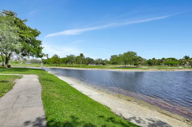 a view of a lake with a big yard