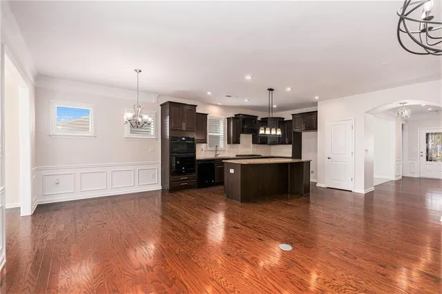 a view of kitchen with wooden floor