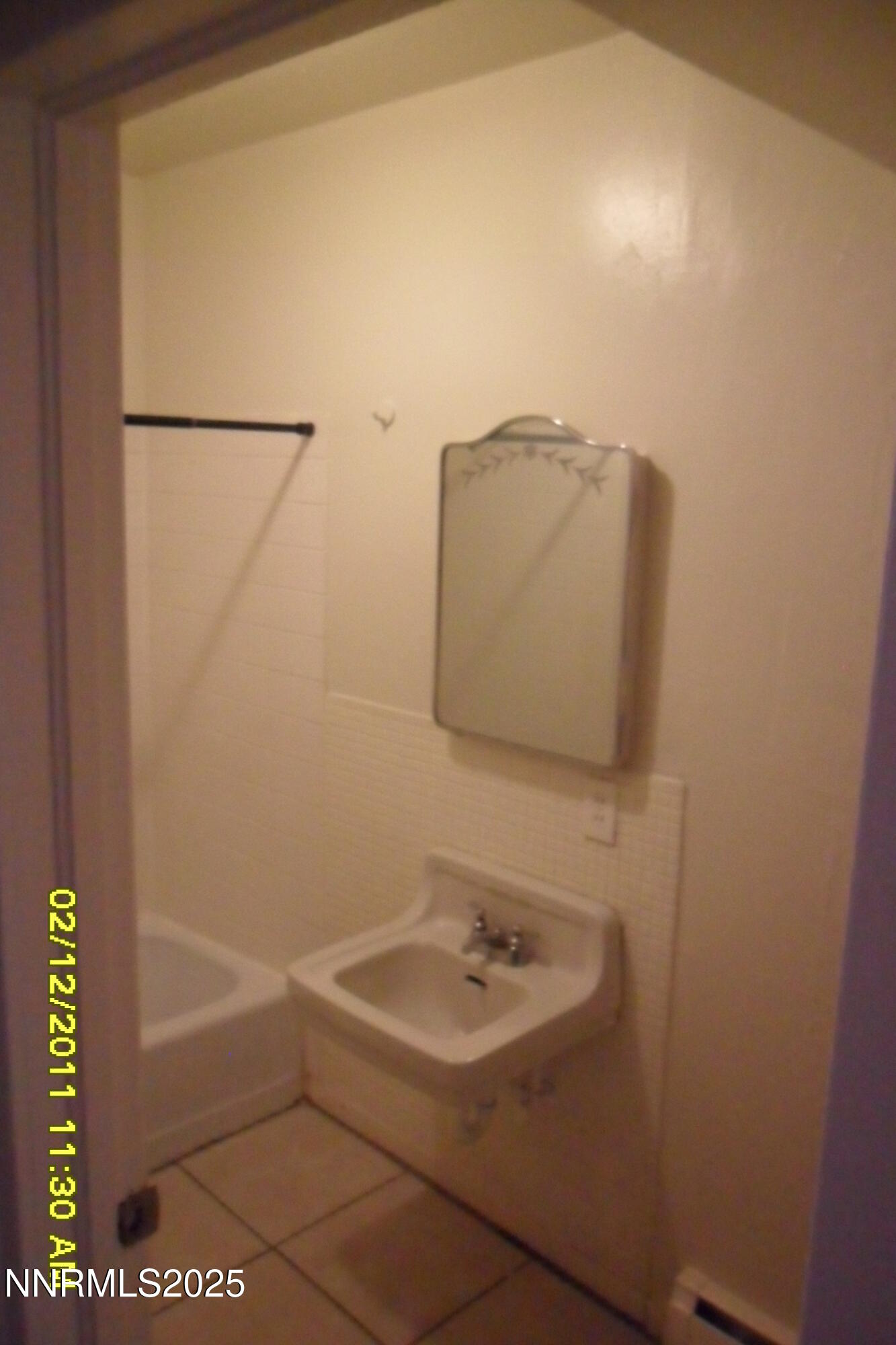 1170 Forest Street Reno, NV 89509 - Photo 20 of 32 a bathroom with a sink and a mirror