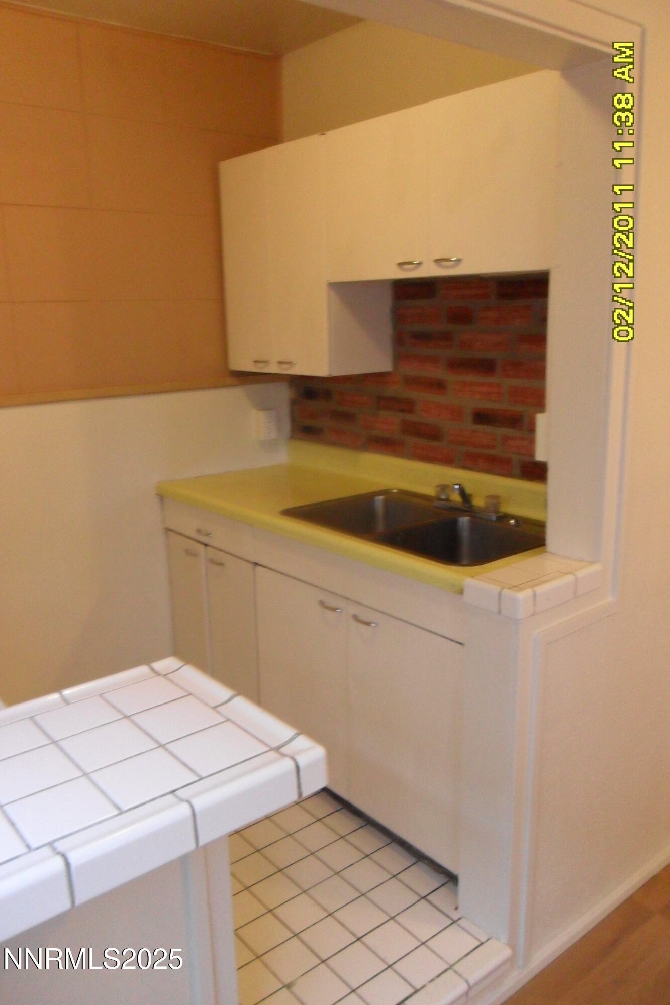 1170 Forest Street Reno, NV 89509 - Photo 24 of 32 a bedroom with a bed and a cabinets