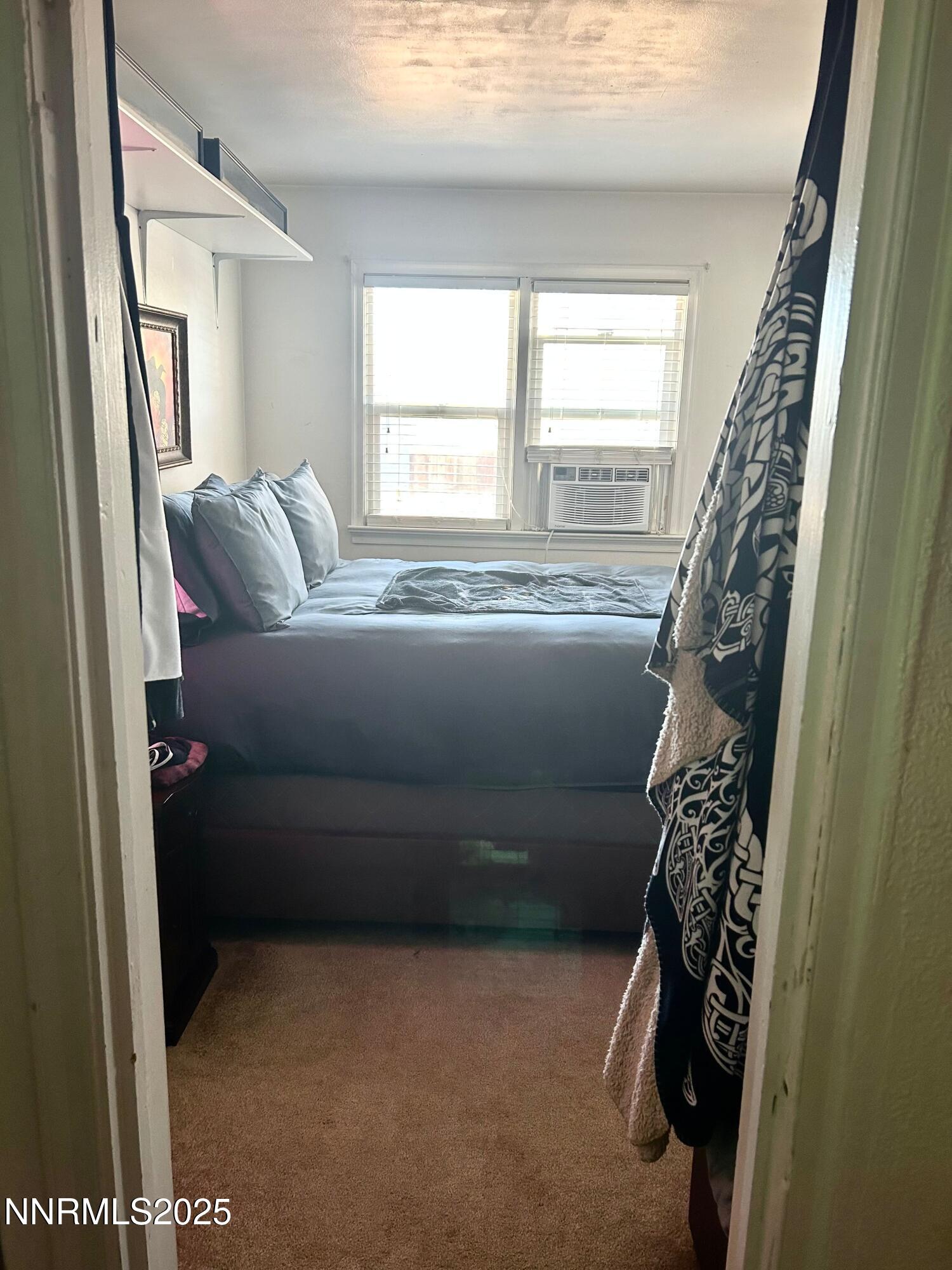 1170 Forest Street Reno, NV 89509 - Photo 32 of 32 a living room with furniture and a window