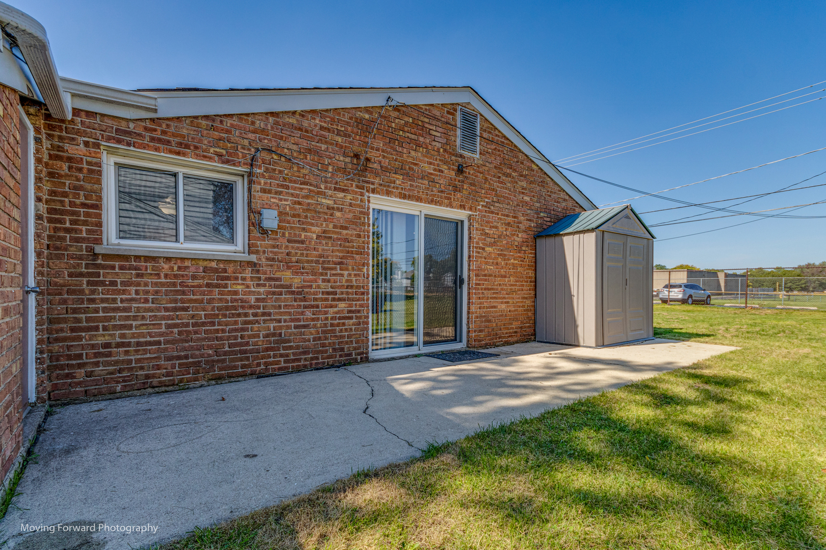 147 Queenswood Road Bolingbrook, IL 60440 - Photo 18 of 20 a view of a backyard of the house