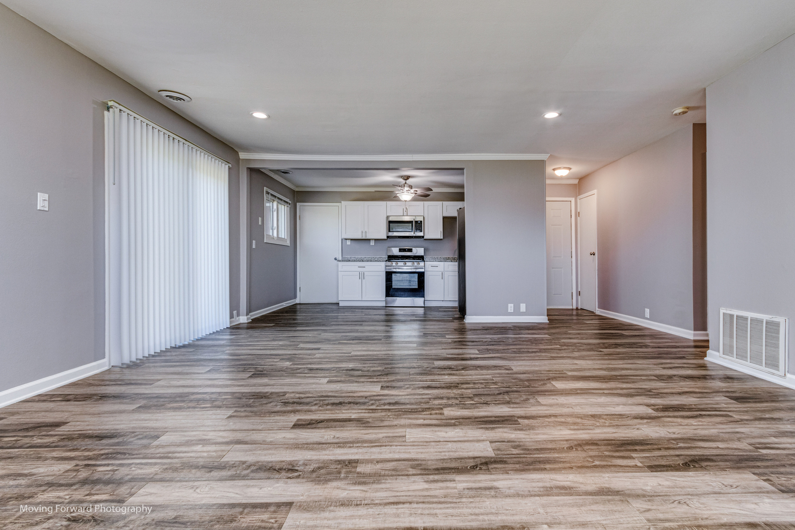 147 Queenswood Road Bolingbrook, IL 60440 - Photo 4 of 20 a view of empty room with wooden floor