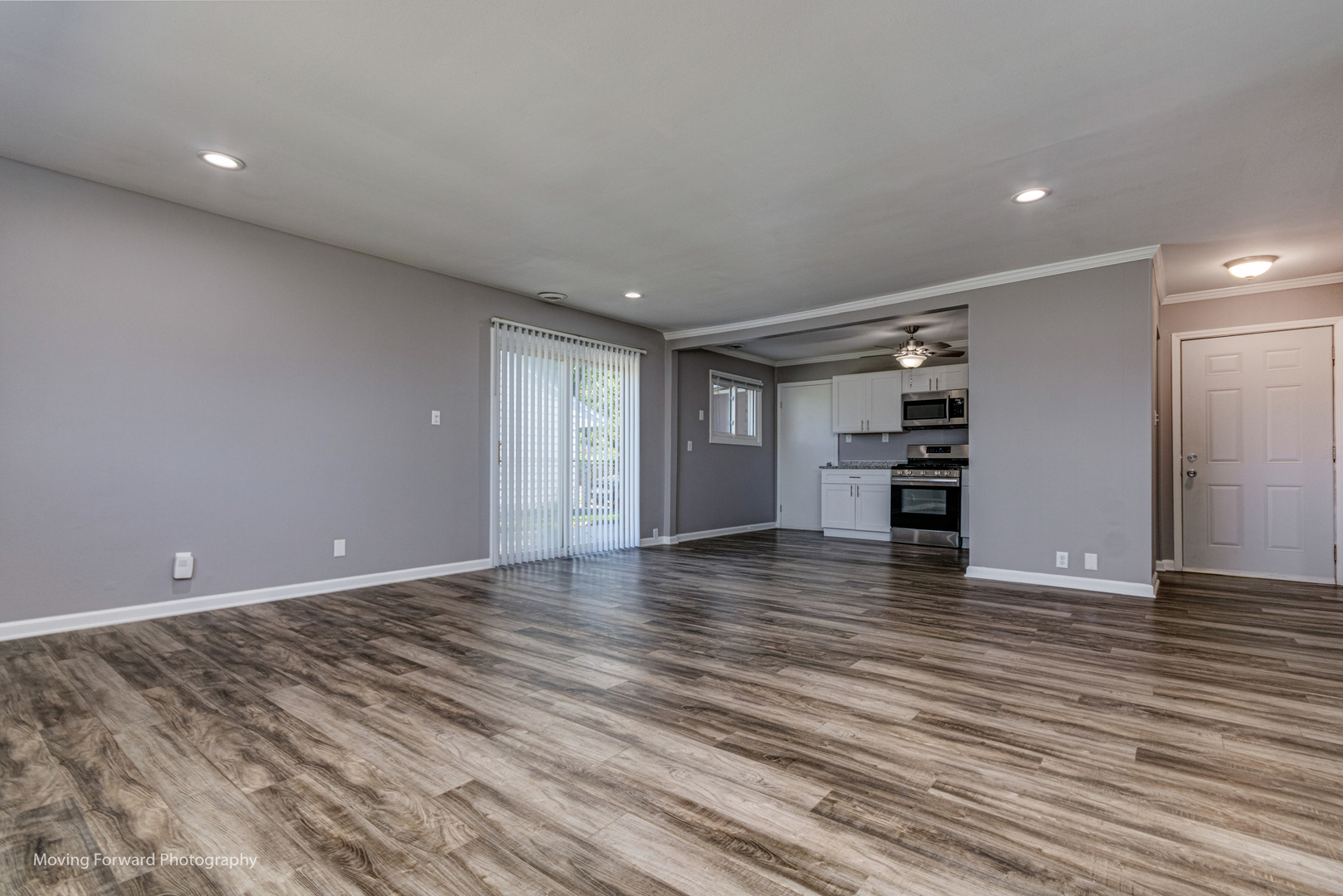 147 Queenswood Road Bolingbrook, IL 60440 - Photo 5 of 20 a view of empty room with wooden floor
