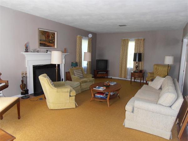 40 Woodsley Road Longmeadow, MA 01106 - Photo 7 of 16 a living room with furniture and a fireplace