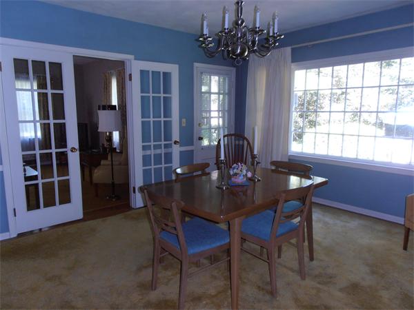 40 Woodsley Road Longmeadow, MA 01106 - Photo 8 of 16 a view of a dining room with furniture and window