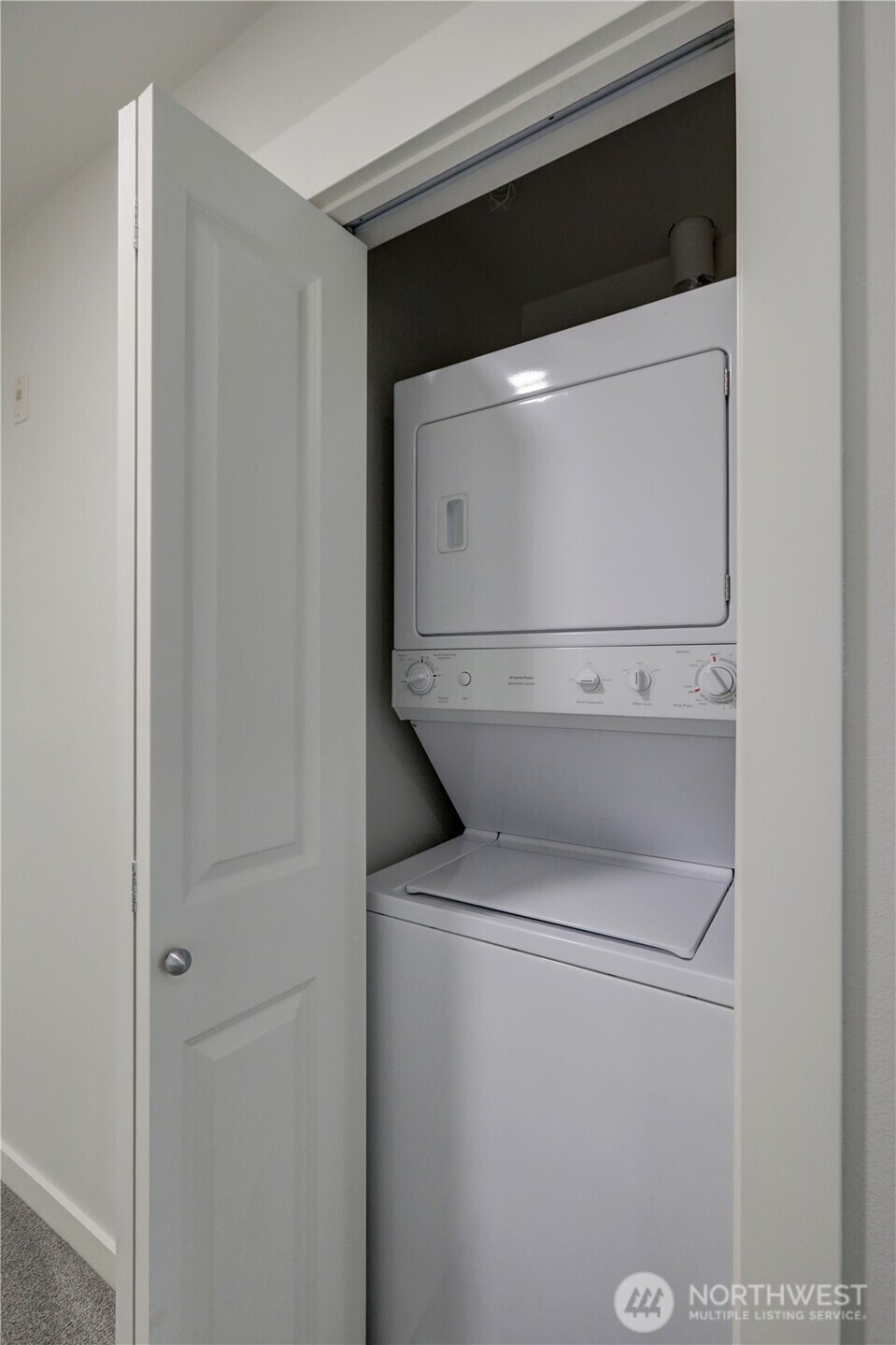 23120 Southeast Black Nugget Road, Unit A2 Issaquah, WA 98029 - Photo 13 of 18 a utility room with dryer and washer