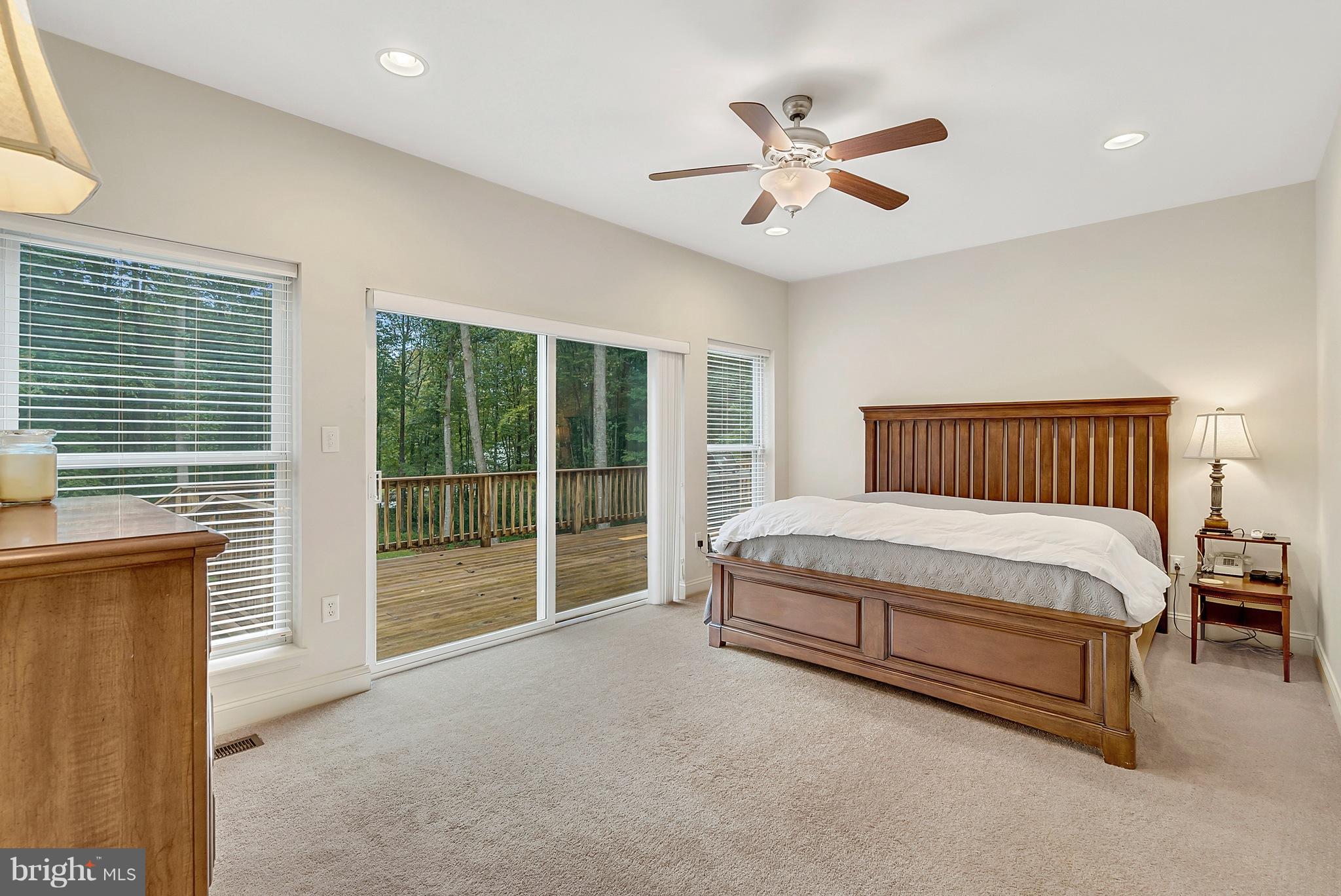 14303 Reva Road Reva, VA 22735 - Photo 15 of 25 a spacious bedroom with a bed and window