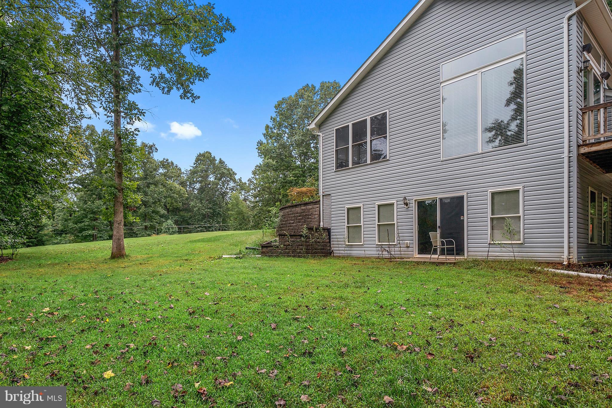14303 Reva Road Reva, VA 22735 - Photo 25 of 25 a view of a house with a yard
