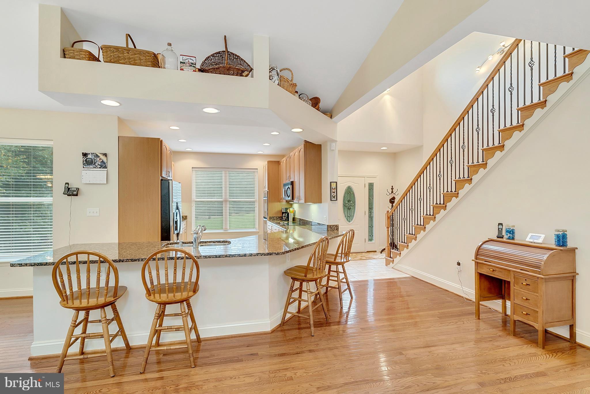 14303 Reva Road Reva, VA 22735 - Photo 5 of 25 a dining room with furniture a chandelier and wooden floor
