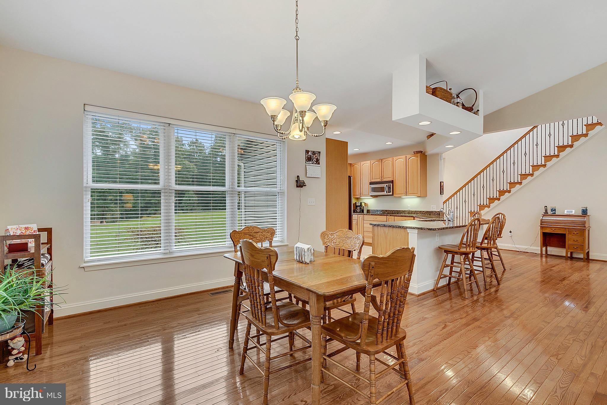 14303 Reva Road Reva, VA 22735 - Photo 8 of 25 a view of a dining room with furniture window and wooden floor