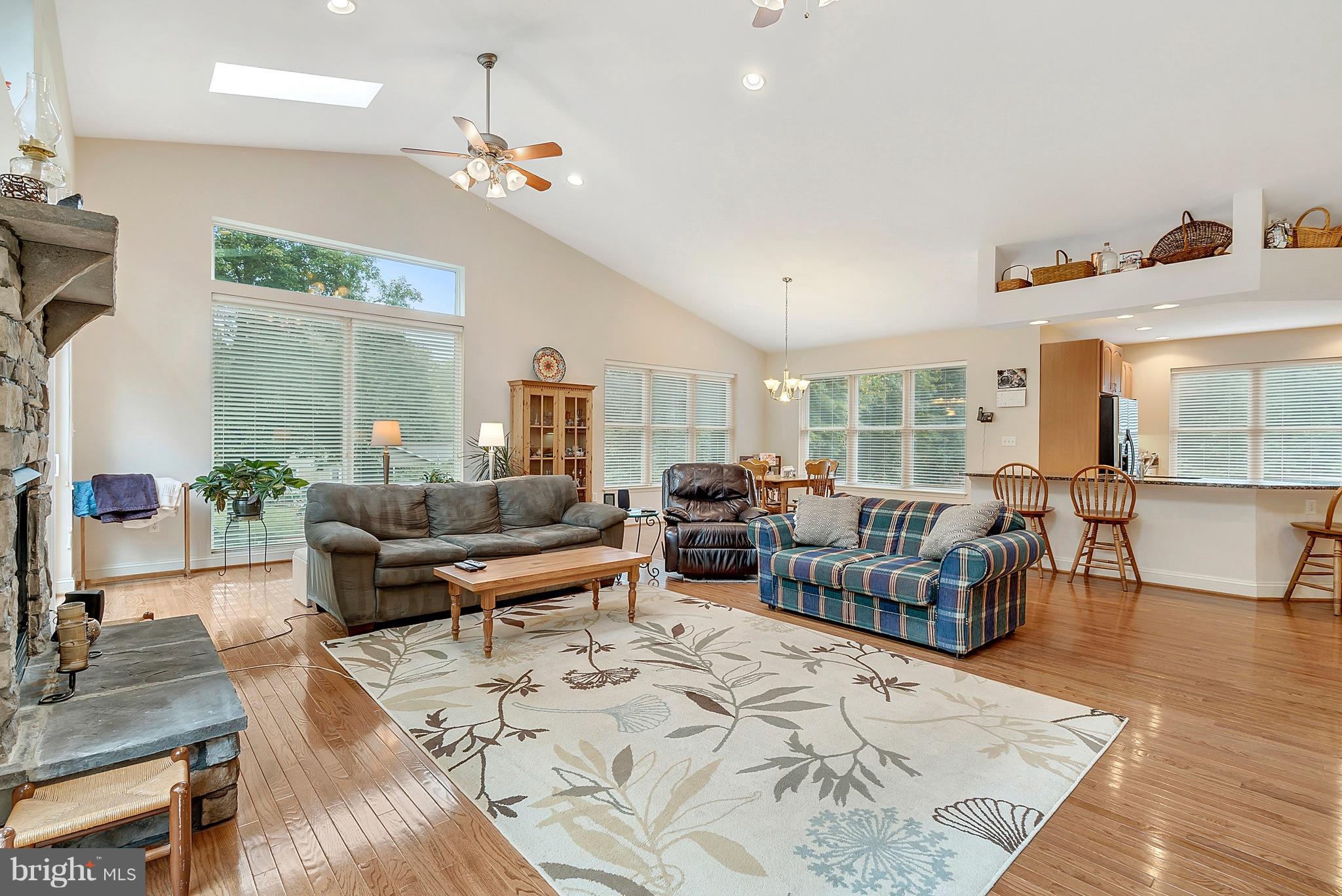14303 Reva Road Reva, VA 22735 - Photo 9 of 25 a living room with furniture kitchen view and large windows