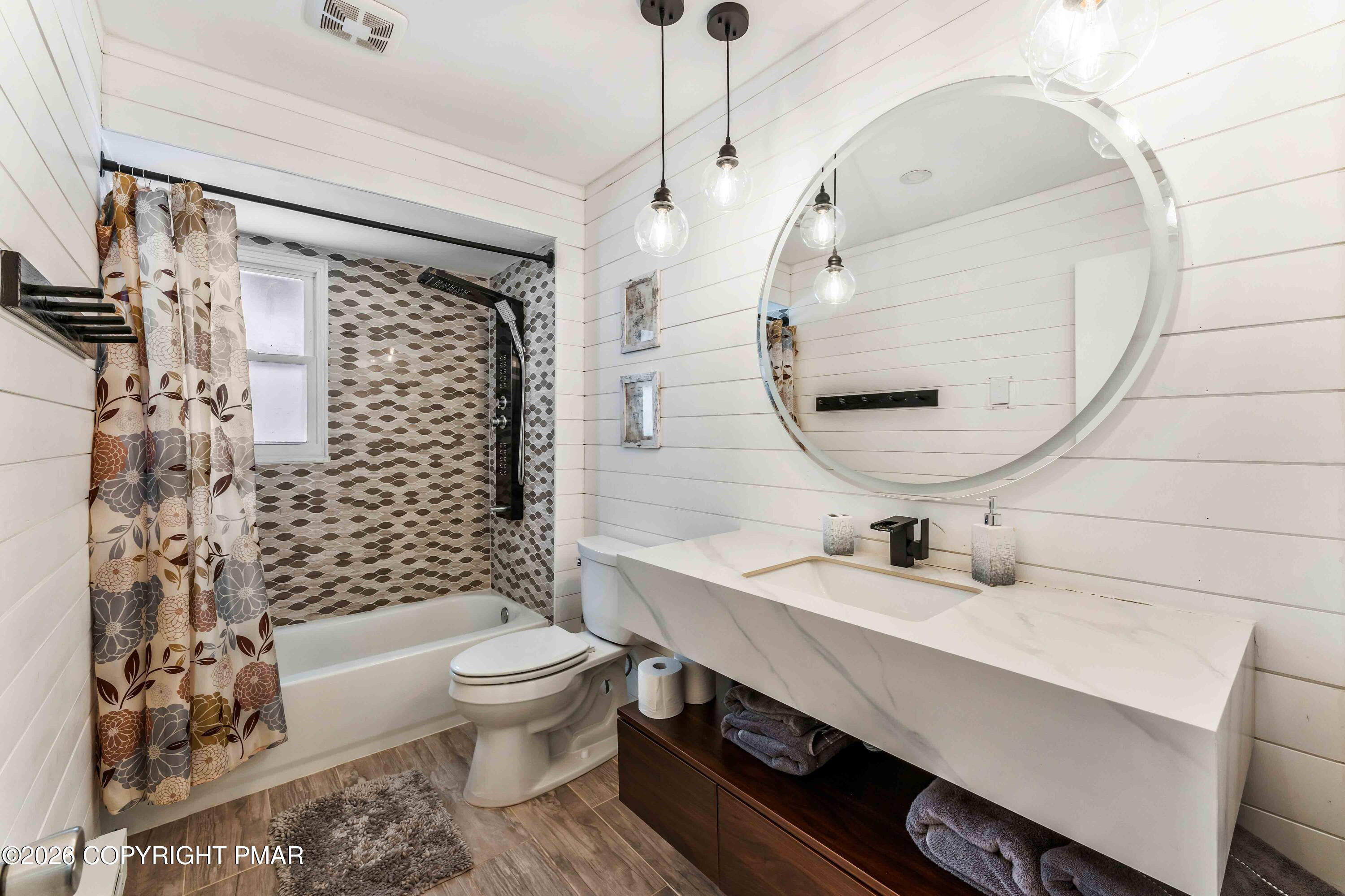 102 King Arthur Road Pocono Lake, PA 18347 - Photo 30 of 59 a bathroom with a sink a toilet and shower