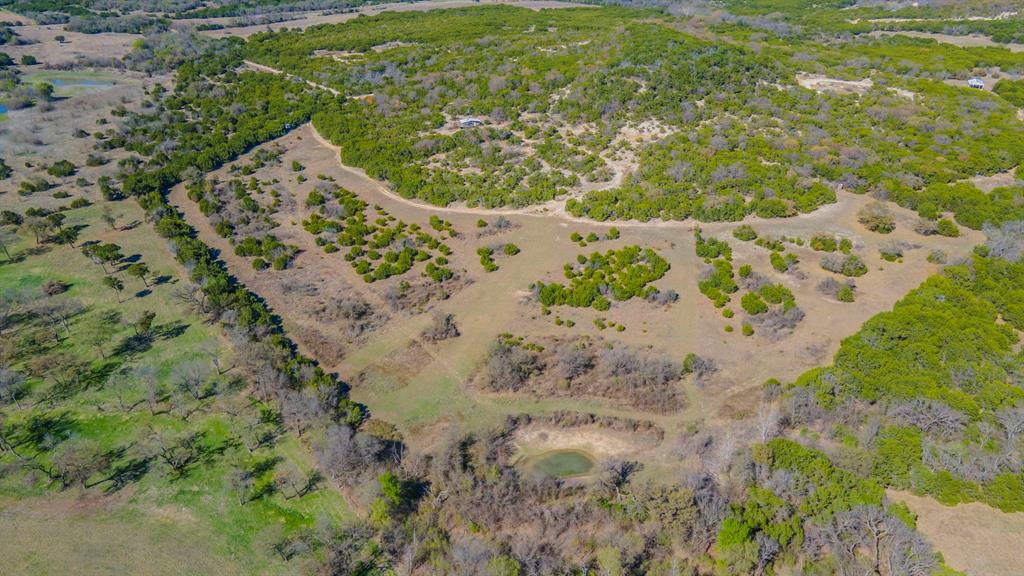 0 Private Road, Unit 4201 Clifton, TX 76634 - Photo 11 of 12 a view of a garden with a tree
