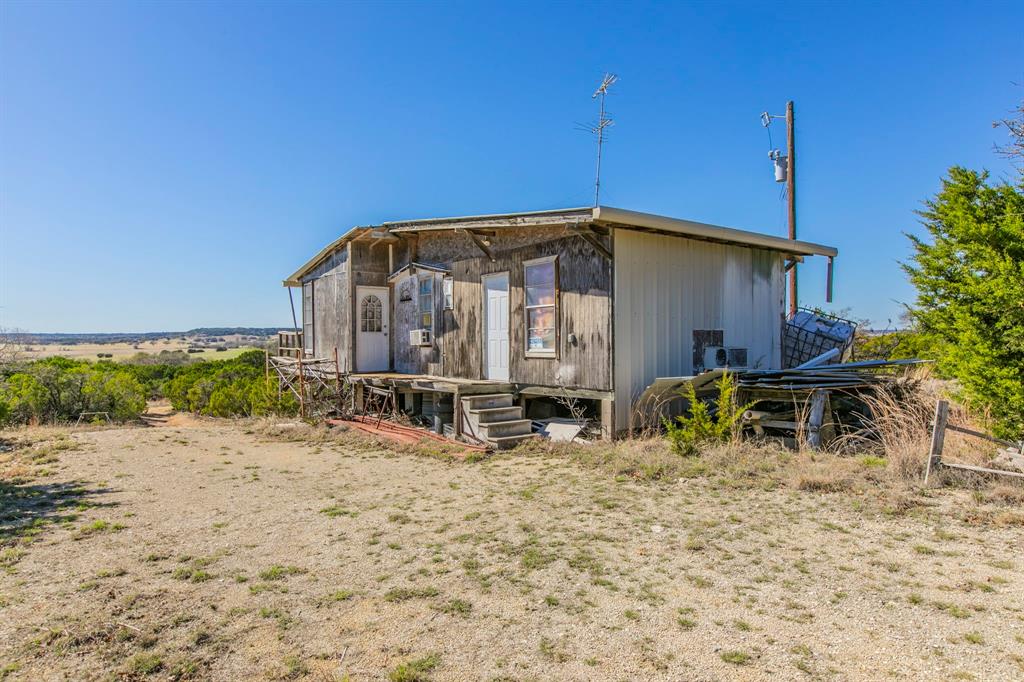 0 Private Road, Unit 4201 Clifton, TX 76634 - Photo 7 of 12 a view of a house with a yard and sitting area