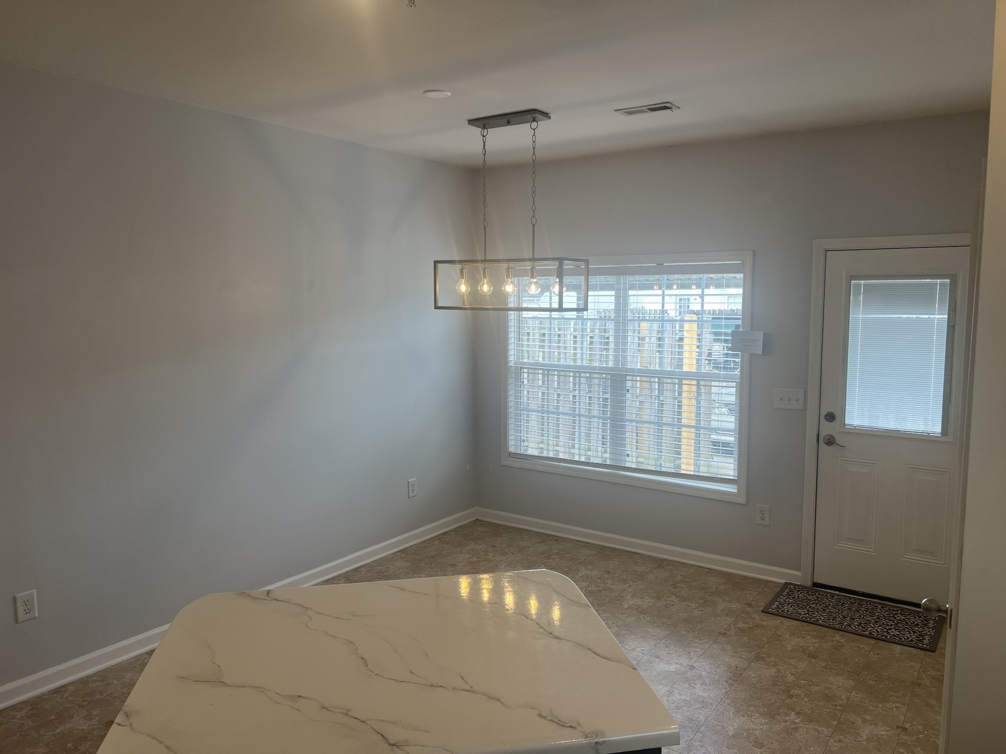 1019 Briggs Lane Spring Hill, TN 37174 - Photo 13 of 20 an empty room with a empty space and windows