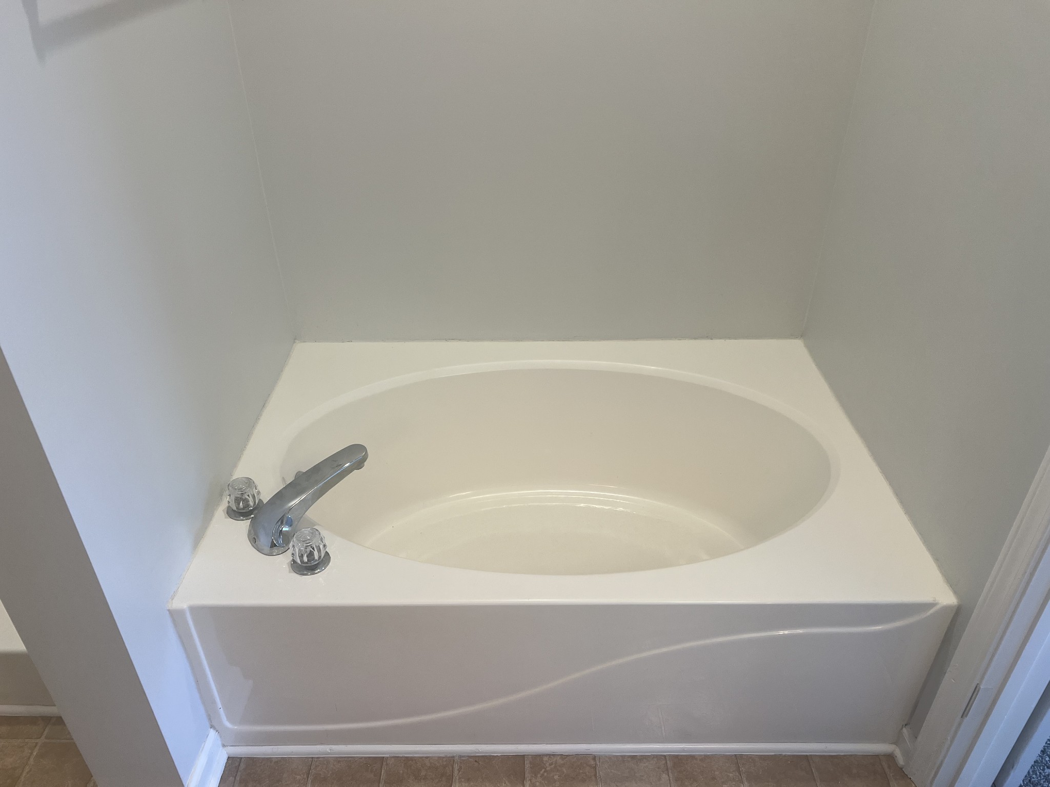 1019 Briggs Lane Spring Hill, TN 37174 - Photo 9 of 20 a white bath tub sitting next to a white sink