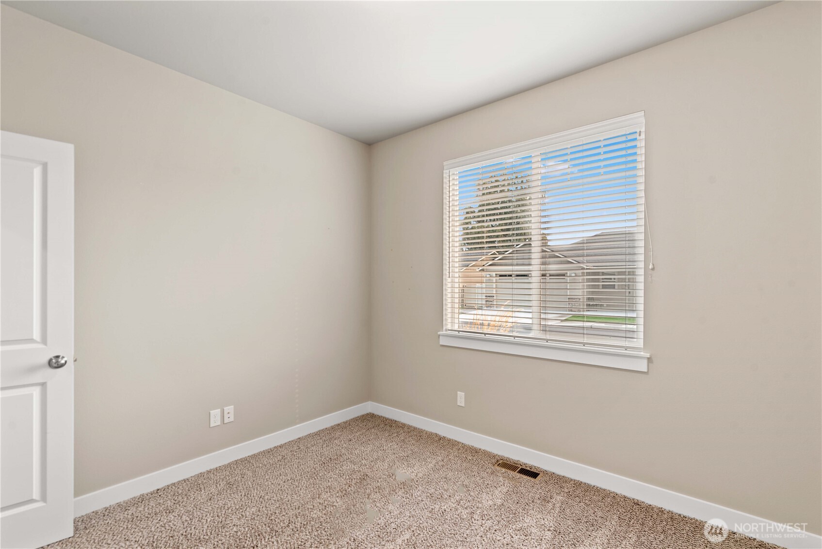 204 Pershing Circle Wenatchee, WA 98801 - Photo 15 of 33 a view of an empty room with a window