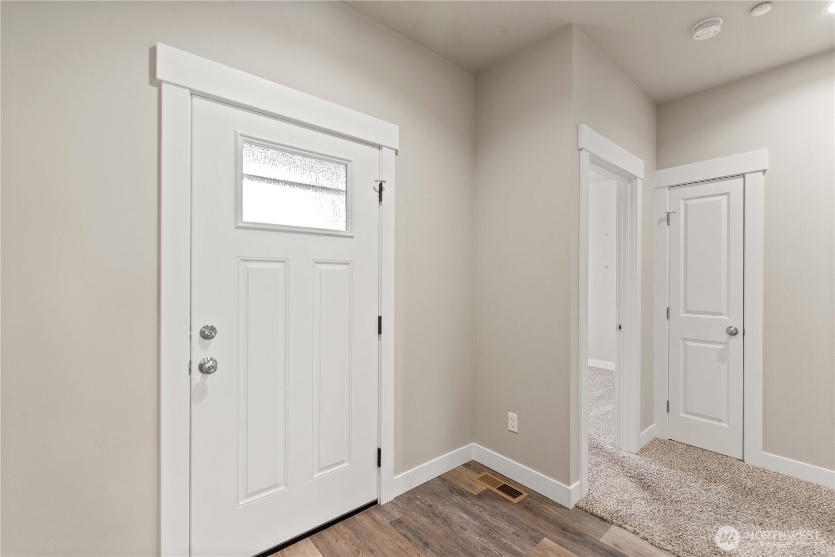 204 Pershing Circle Wenatchee, WA 98801 - Photo 3 of 33 a view of an empty room with wooden floor