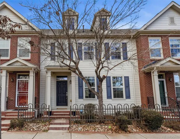 front view of a house with a small yard
