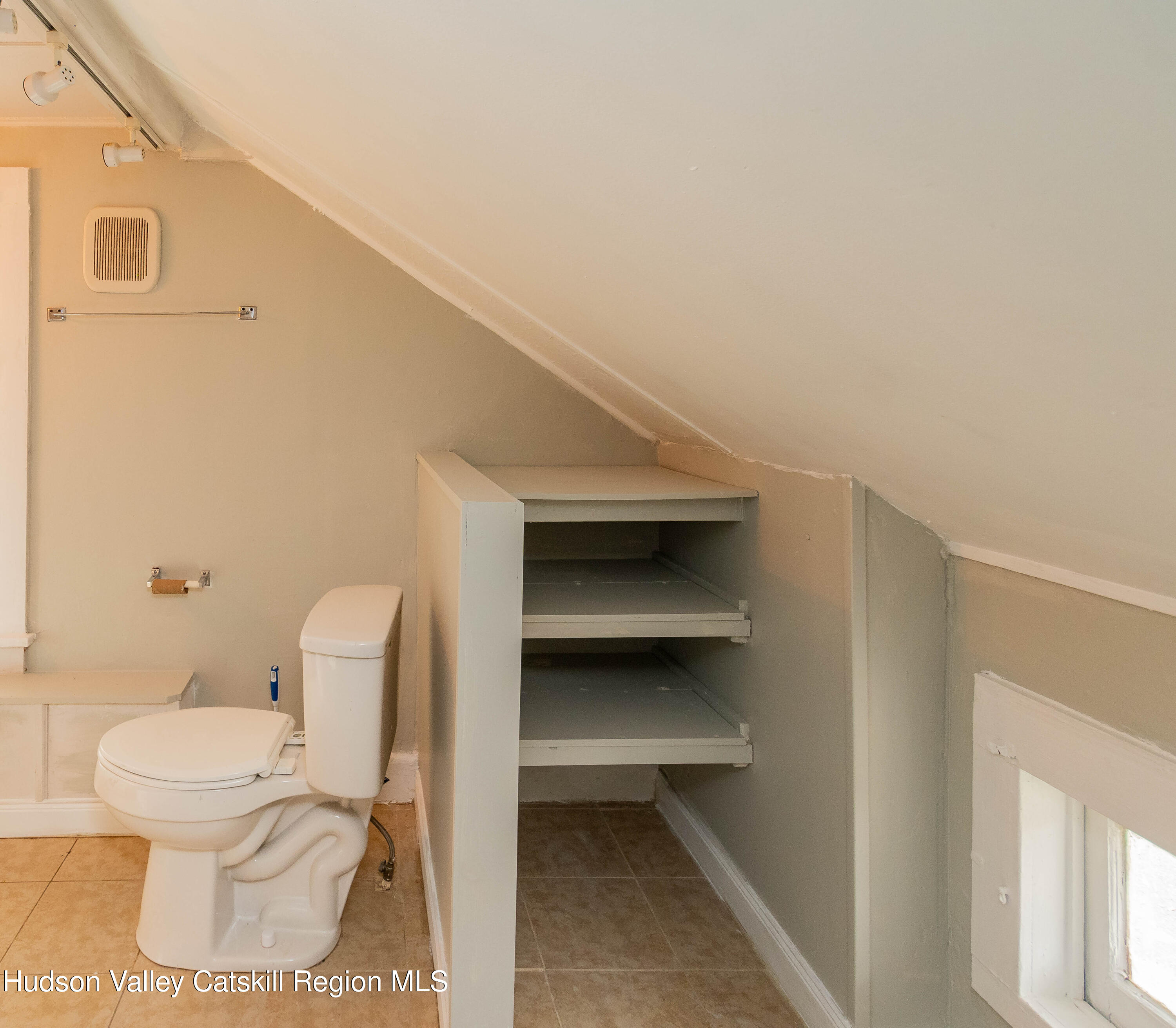 131 Station Road New Paltz, NY 12561 - Photo 25 of 31 a bathroom with a toilet and a vanity