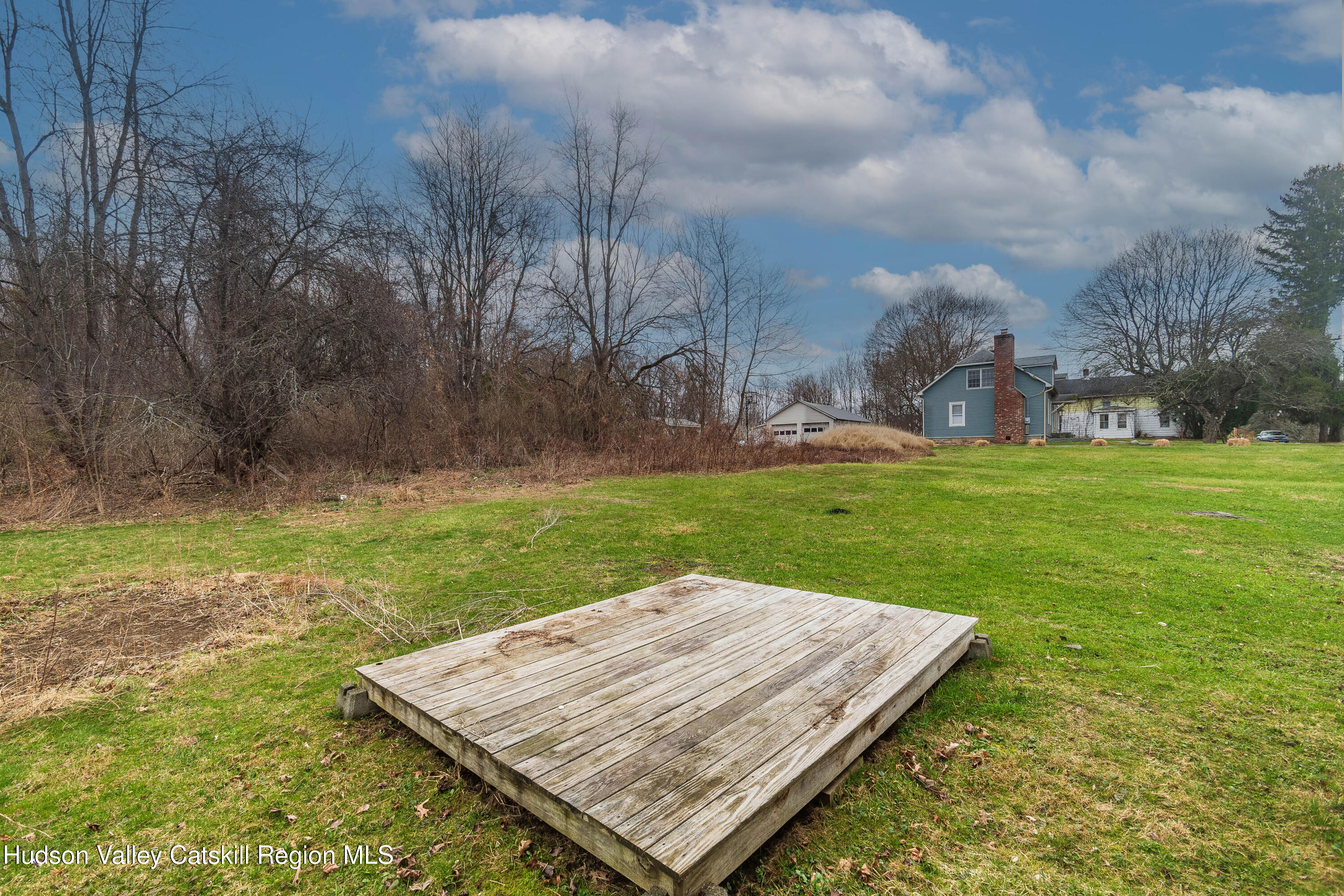 131 Station Road New Paltz, NY 12561 - Photo 29 of 31 a view of a backyard with sitting area