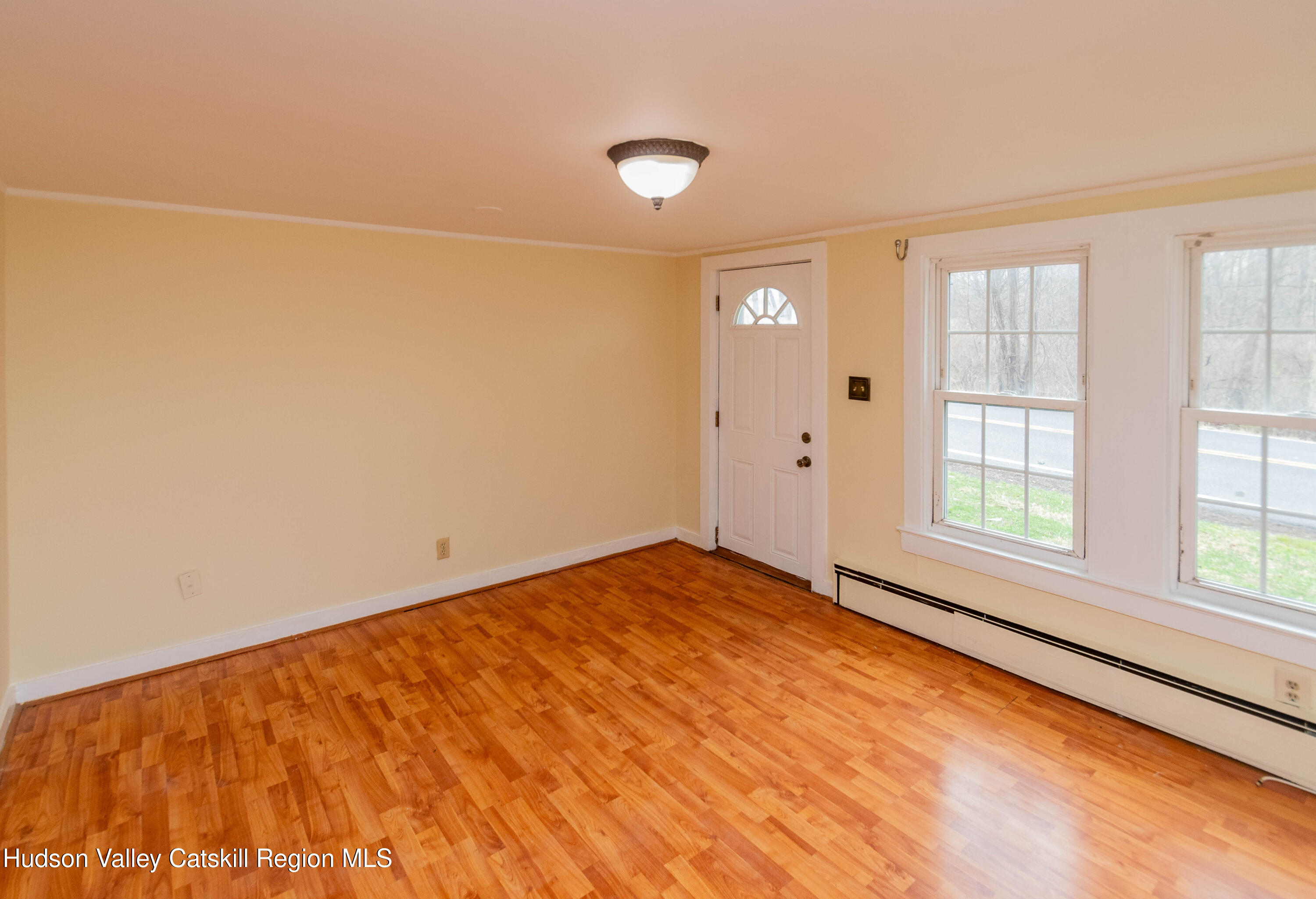 131 Station Road New Paltz, NY 12561 - Photo 3 of 31 a view of an empty room with a window