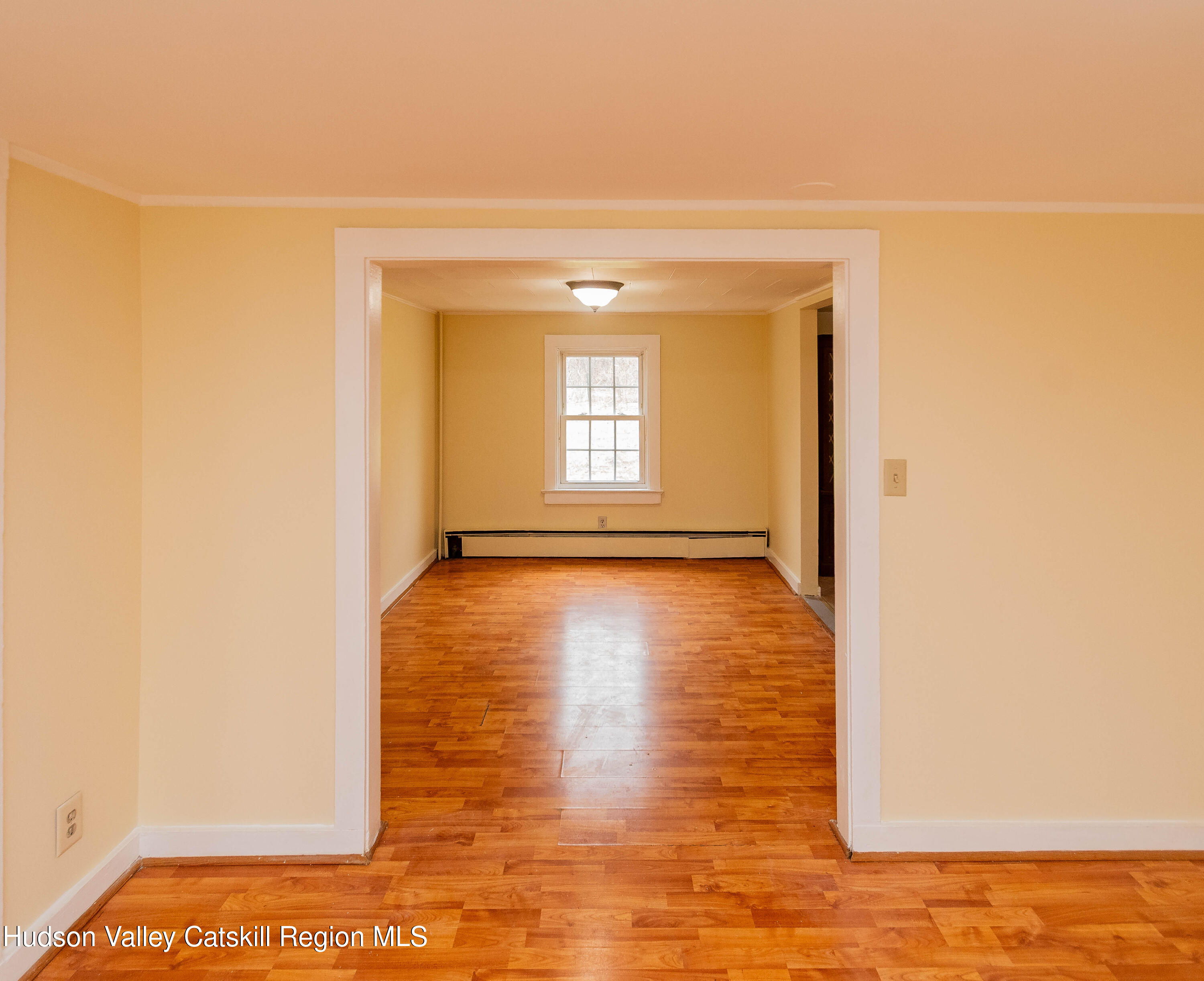 131 Station Road New Paltz, NY 12561 - Photo 4 of 31 a view of a room with wooden floor and window