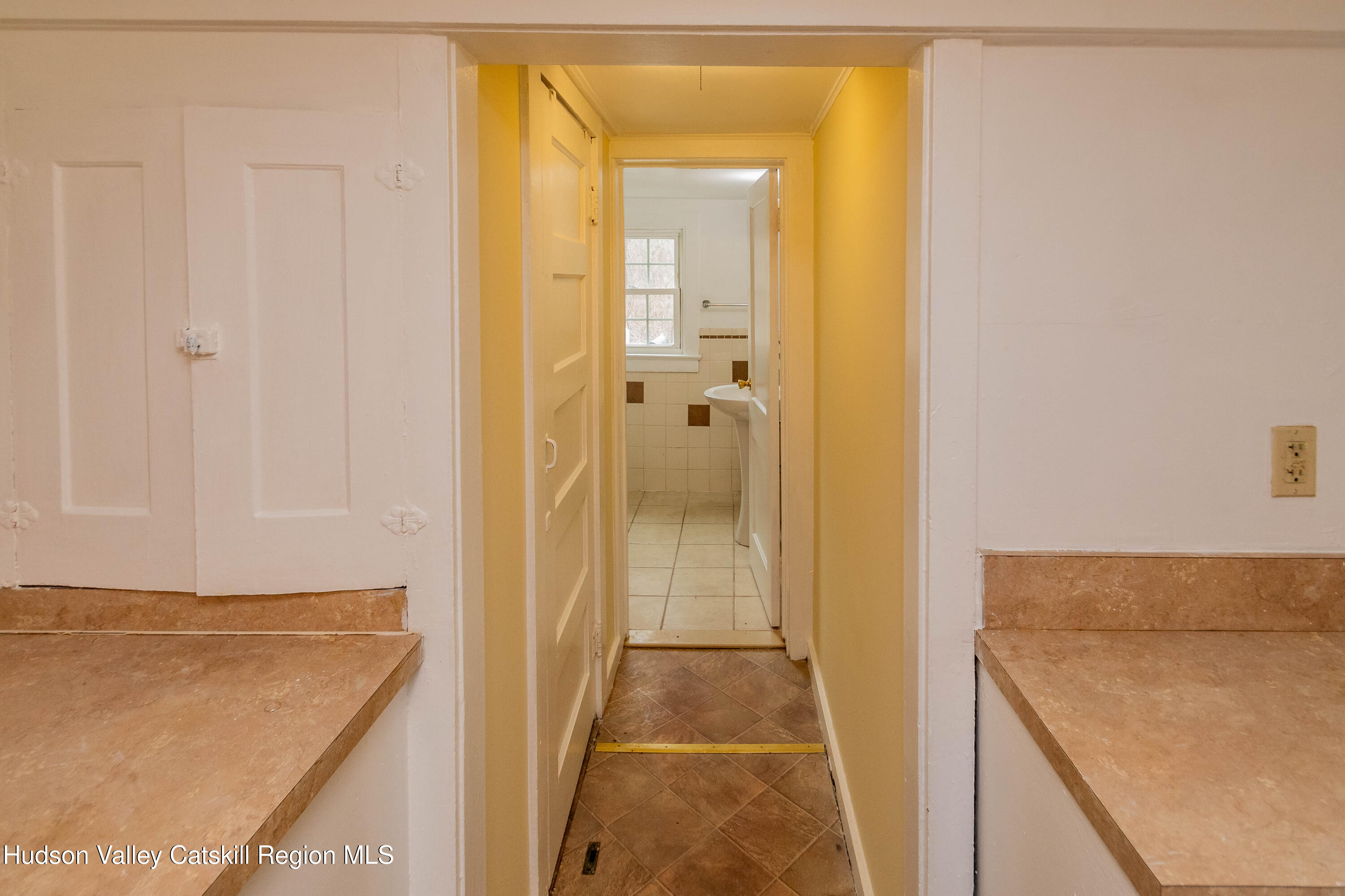131 Station Road New Paltz, NY 12561 - Photo 8 of 31 a bathroom with a granite countertop sink and a mirror