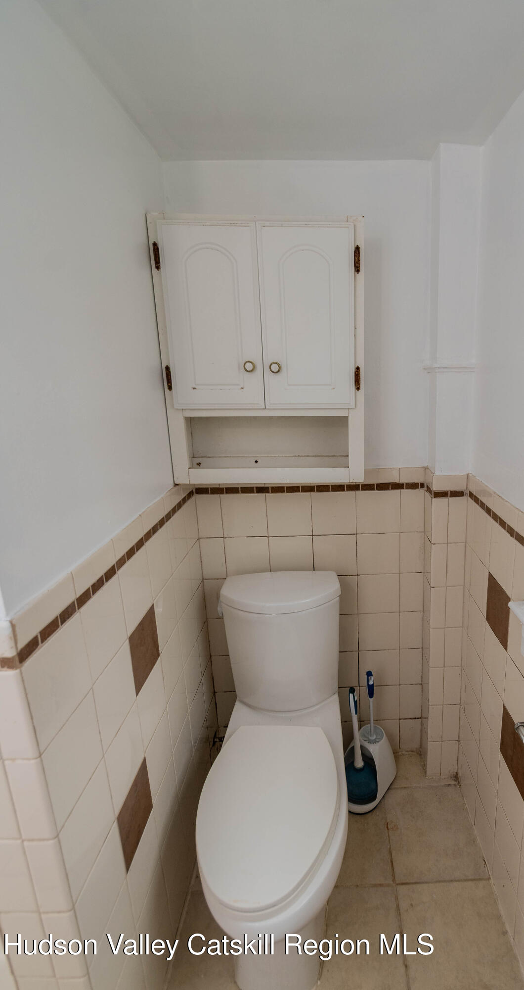 131 Station Road New Paltz, NY 12561 - Photo 9 of 31 a bathroom with a toilet and a shower