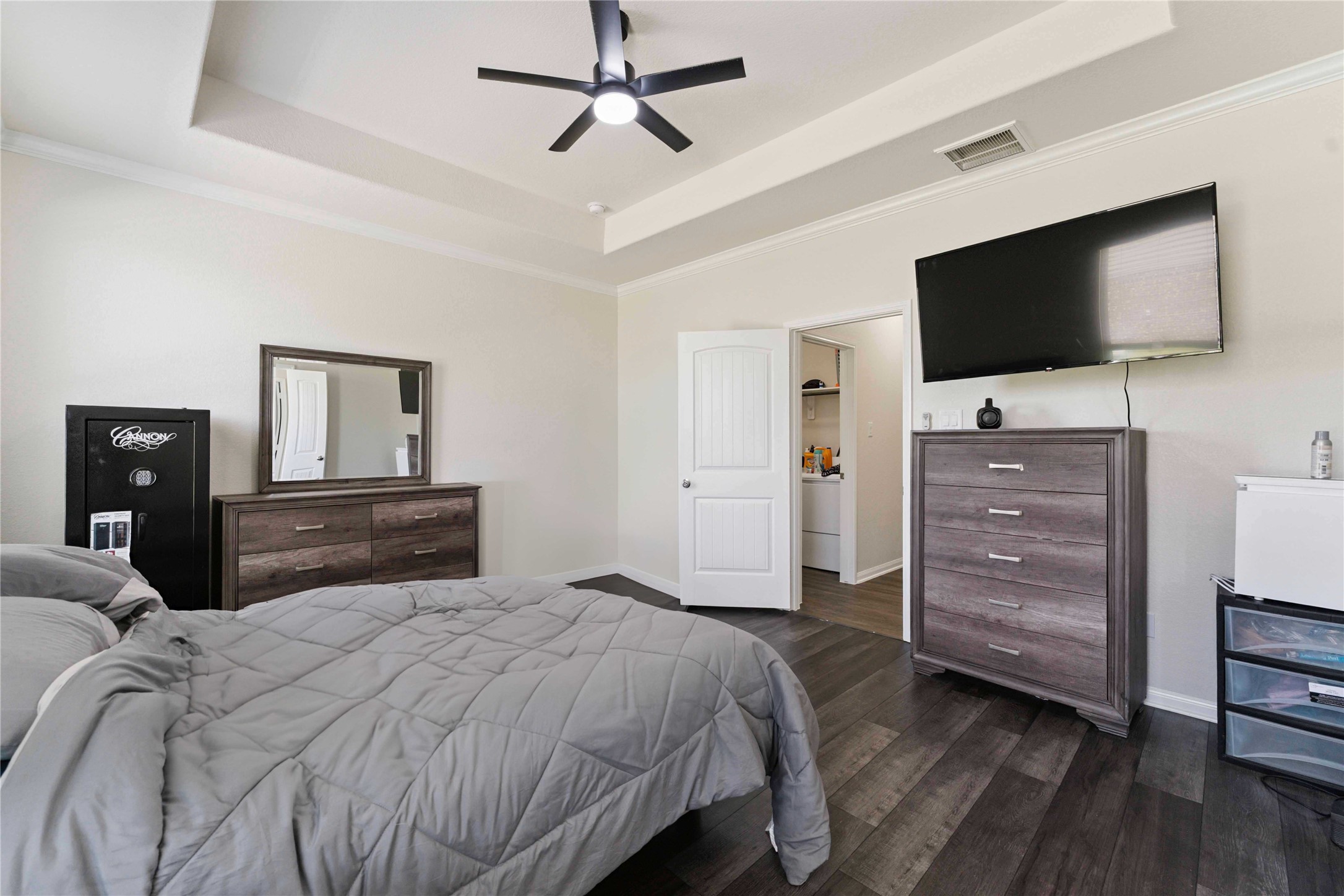 7718 Kovar Road Beasley, TX 77417 - Photo 12 of 30 a bedroom with a bed and a flat screen tv