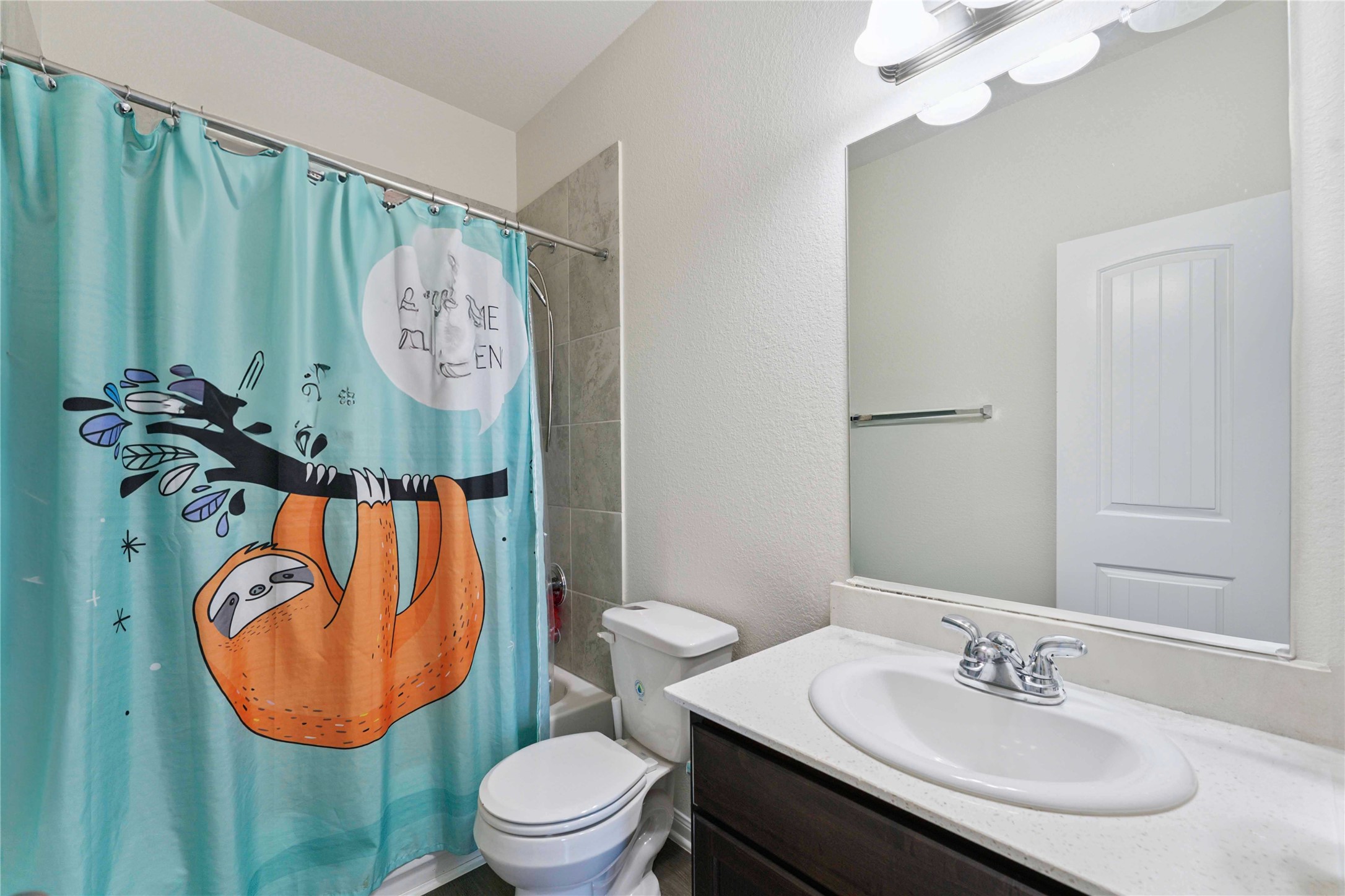 7718 Kovar Road Beasley, TX 77417 - Photo 18 of 30 a bathroom with a toilet sink and mirror