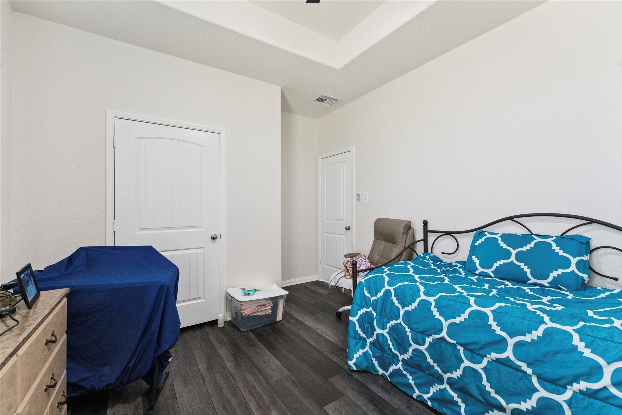 7718 Kovar Road Beasley, TX 77417 - Photo 23 of 30 a bedroom with a bed and a chair