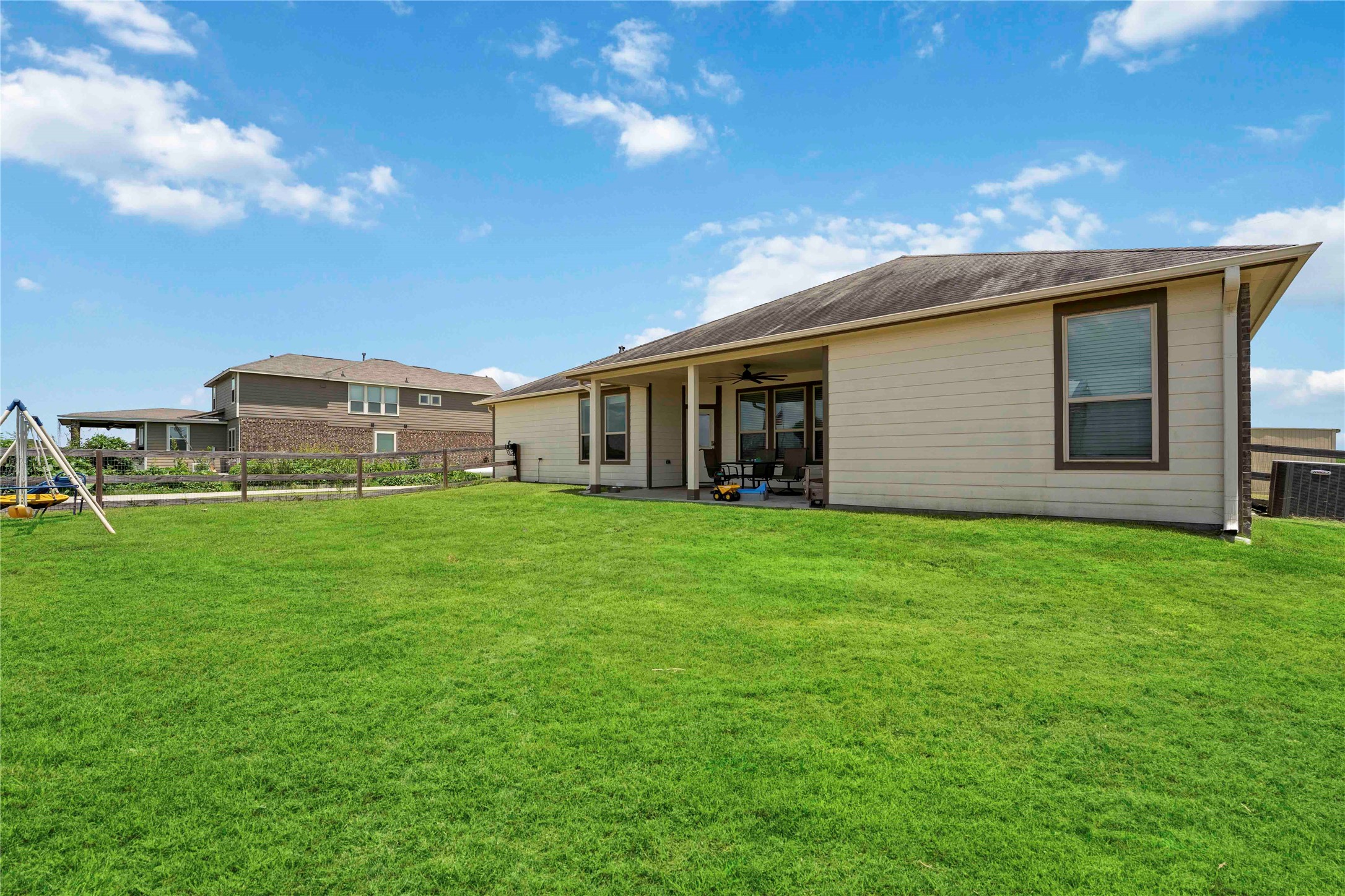 7718 Kovar Road Beasley, TX 77417 - Photo 27 of 30 a front view of house with yard and green space