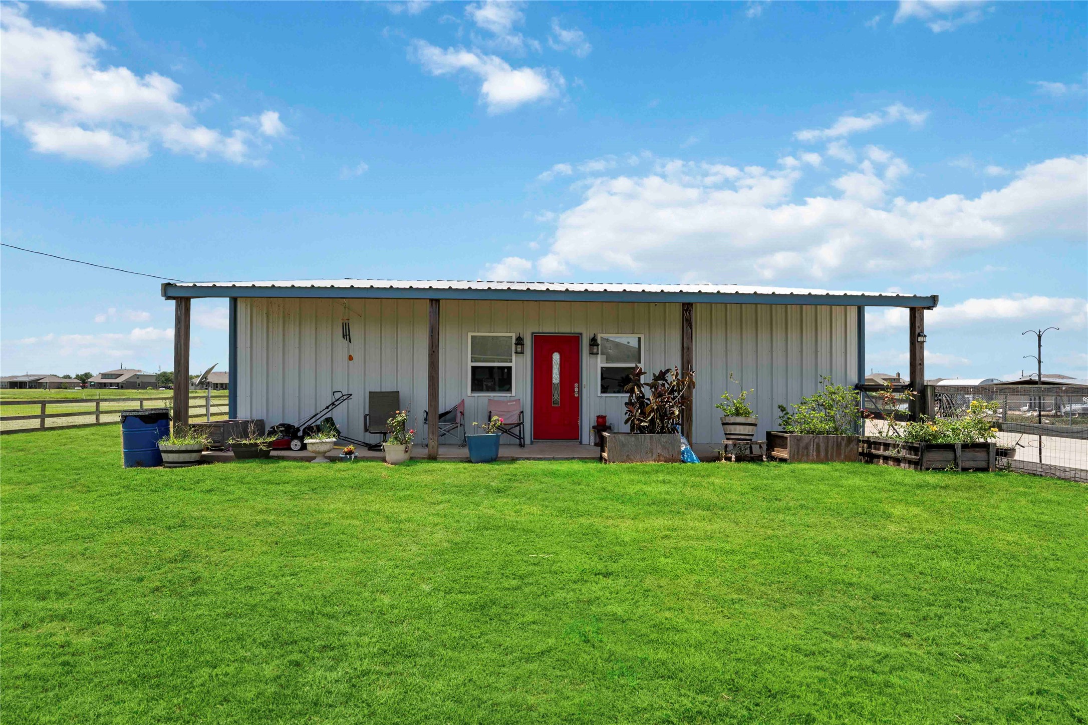 7718 Kovar Road Beasley, TX 77417 - Photo 28 of 30 a view of a house with yard and porch