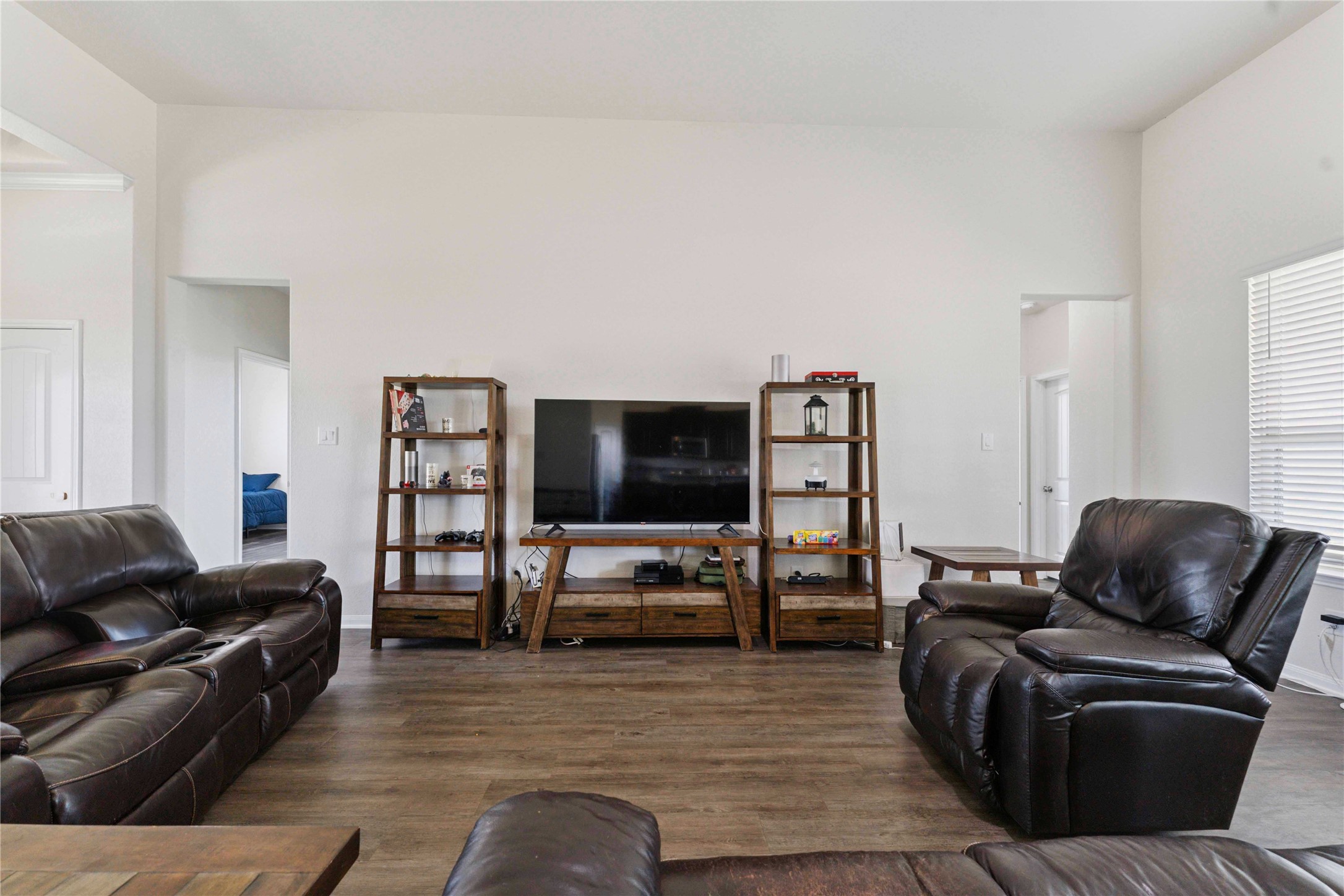 7718 Kovar Road Beasley, TX 77417 - Photo 5 of 30 a living room with furniture and a flat screen tv
