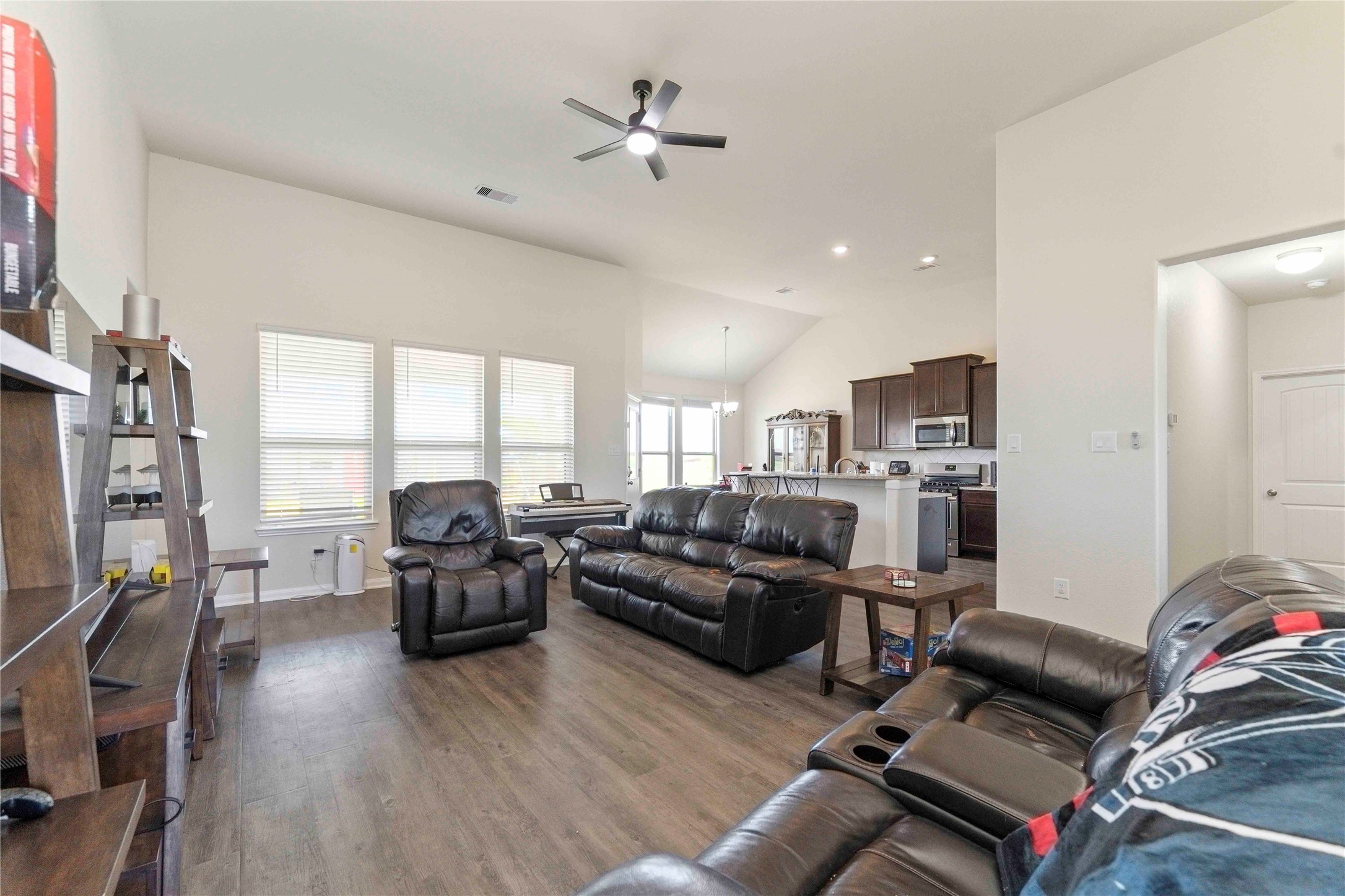 7718 Kovar Road Beasley, TX 77417 - Photo 7 of 30 a living room with furniture kitchen view and a large window