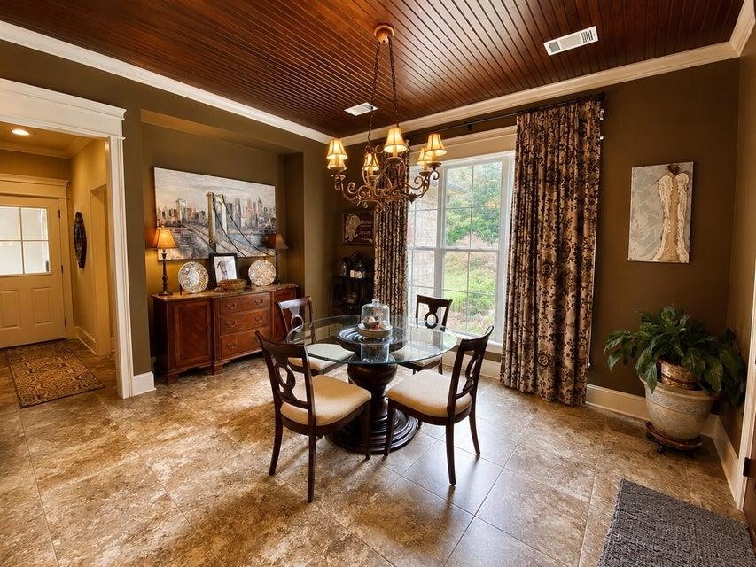 295 North Ridge Drive Saltillo, MS 38866 - Photo 10 of 38 a view of a porch with dining table and chairs