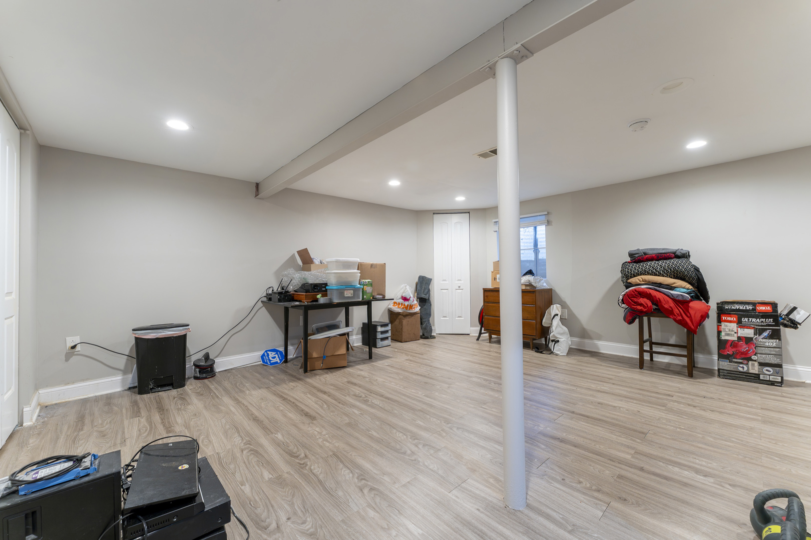 513 Jill Lane Bolingbrook, IL 60440 - Photo 18 of 20 a view of a room with furniture and wooden floor