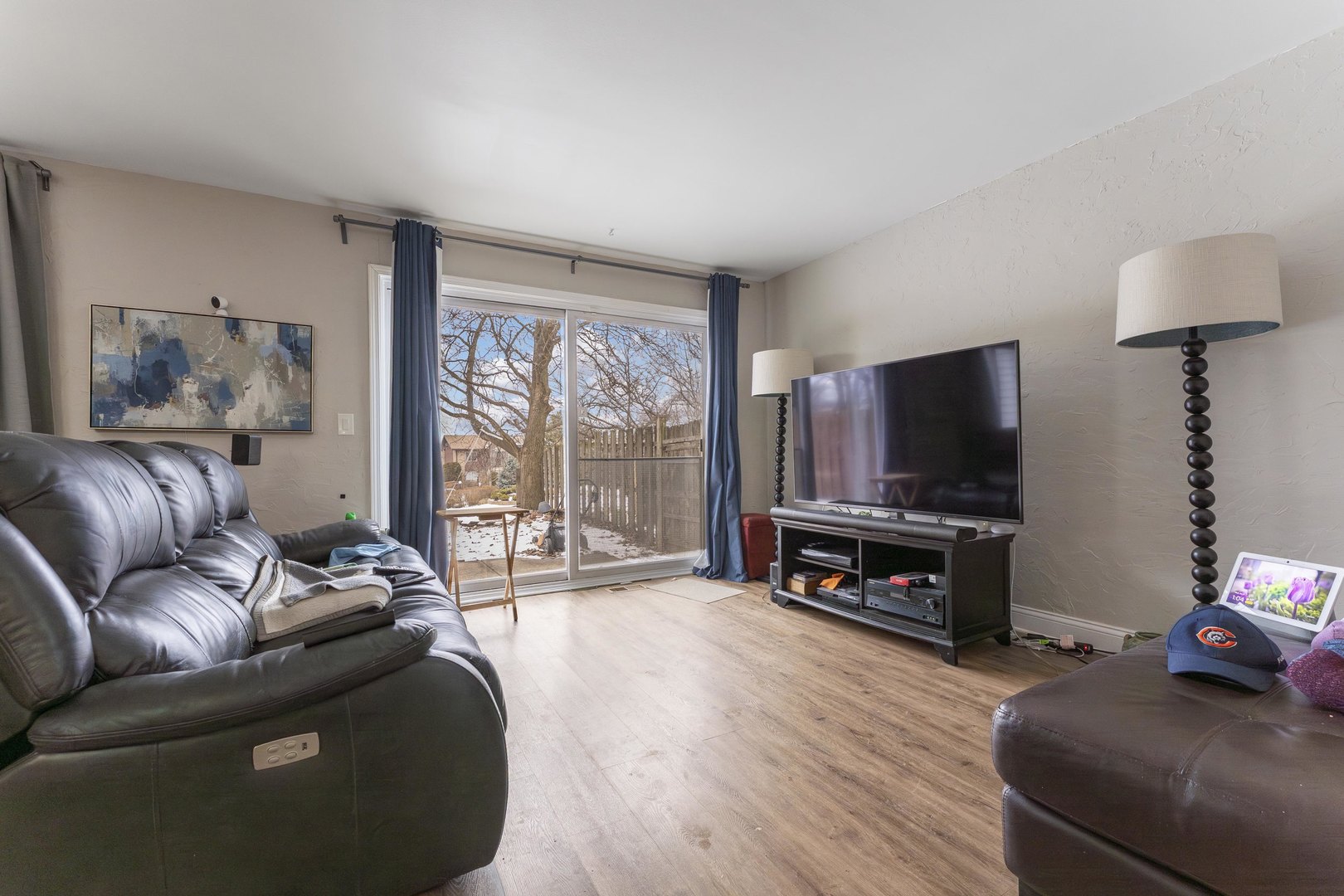 513 Jill Lane Bolingbrook, IL 60440 - Photo 2 of 20 a living room with furniture and a flat screen tv