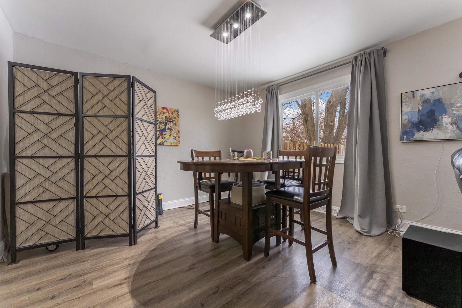 513 Jill Lane Bolingbrook, IL 60440 - Photo 4 of 20 a view of a dining room with furniture and wooden floor