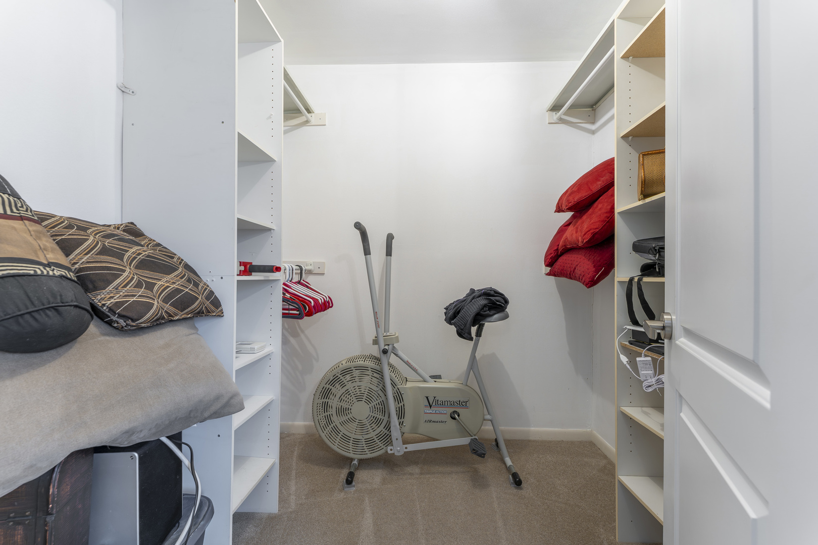 513 Jill Lane Bolingbrook, IL 60440 - Photo 8 of 20 a bedroom with a bed and a chandelier